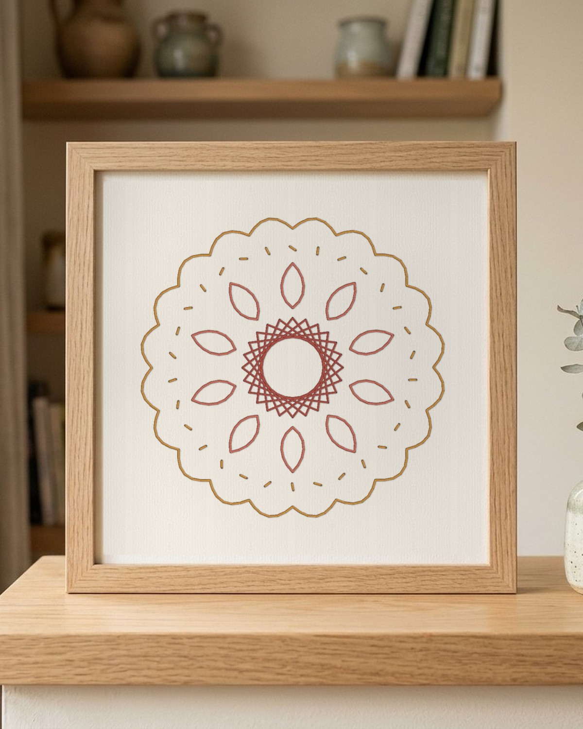 A framed paper embroidery medallion at home